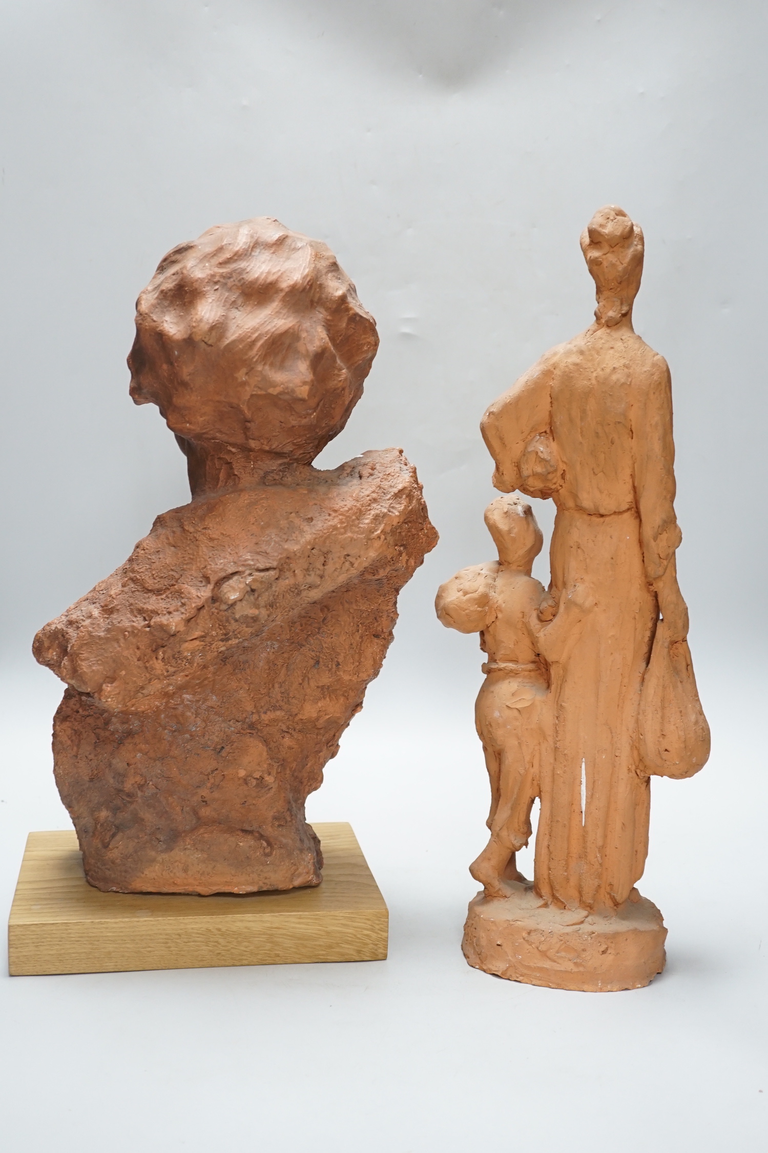 Marcus Cornish (1964-) - ‘’Refugee’’, a terracotta sculpture and one other terracotta sculpture of a mother and child, indistinctly signed, the largest 46cm high (2)